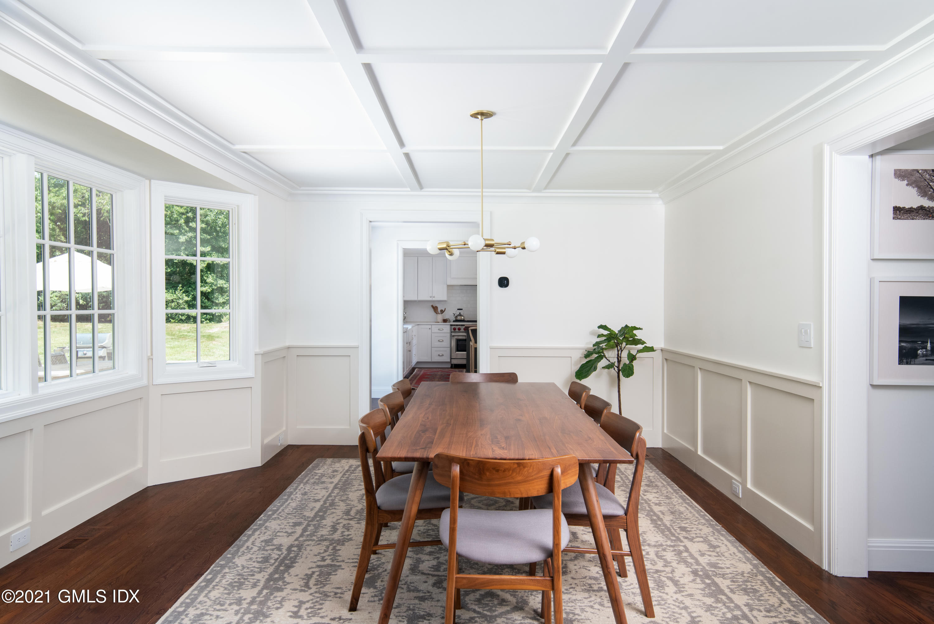 10 Pine Ridge Road Greenwich, CT 06830 - Photo 4 of 17 a view of a dining room with furniture window and wooden floor