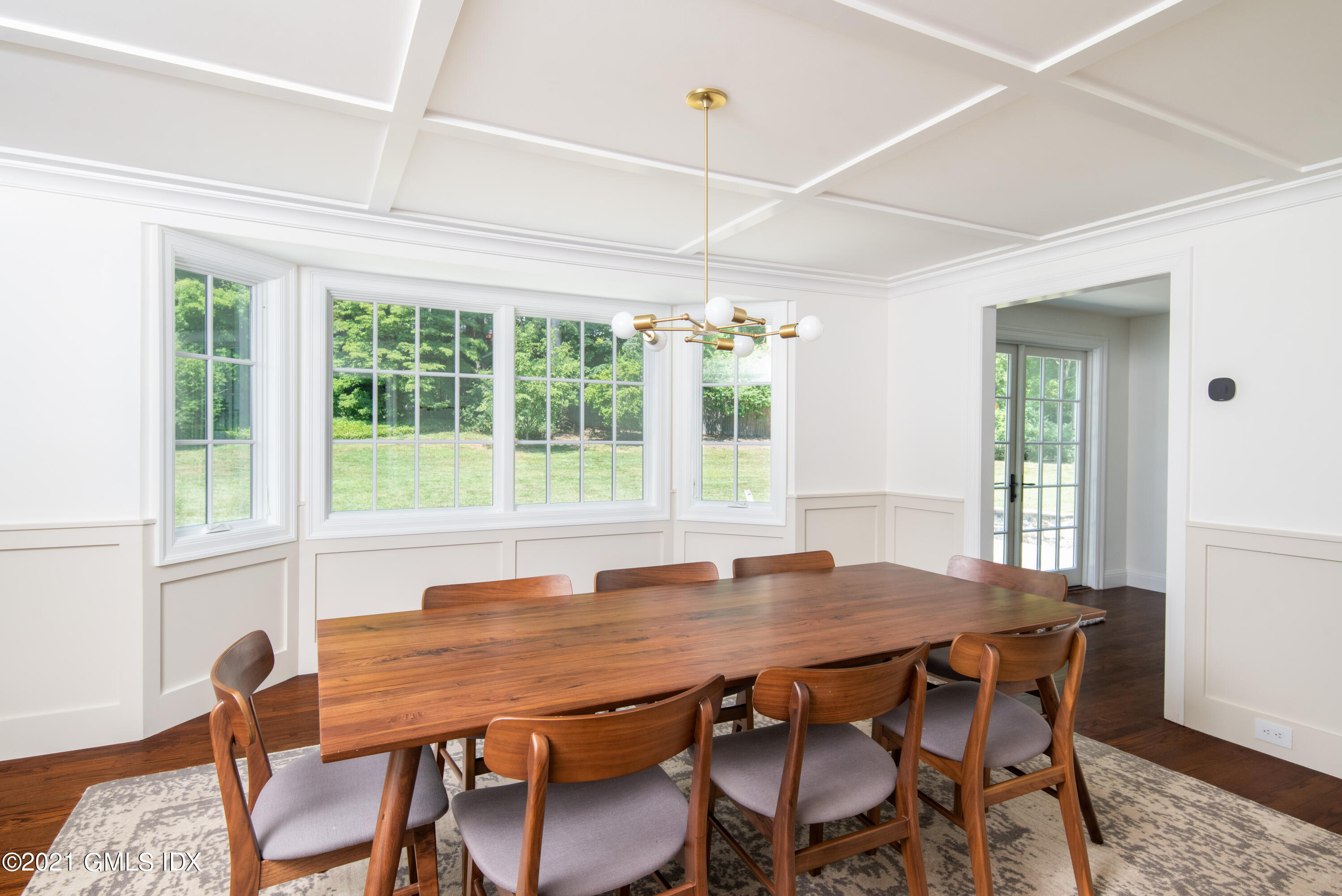 10 Pine Ridge Road Greenwich, CT 06830 - Photo 5 of 17 a view of a dining room with furniture window and wooden floor