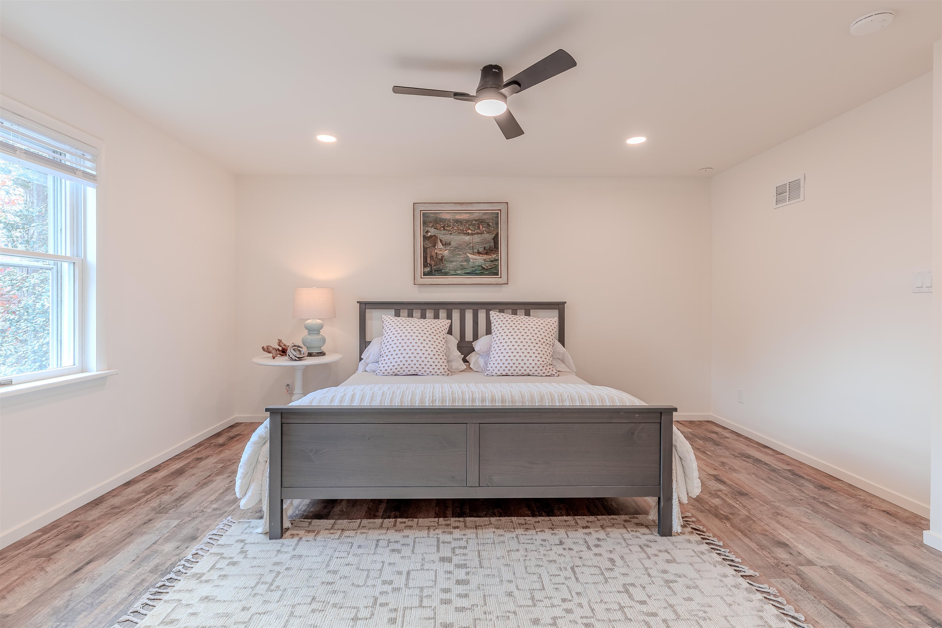 206 Holly Drive Rio Grande, NJ 08242 - Photo 18 of 30 a bedroom with a bed and a ceiling fan