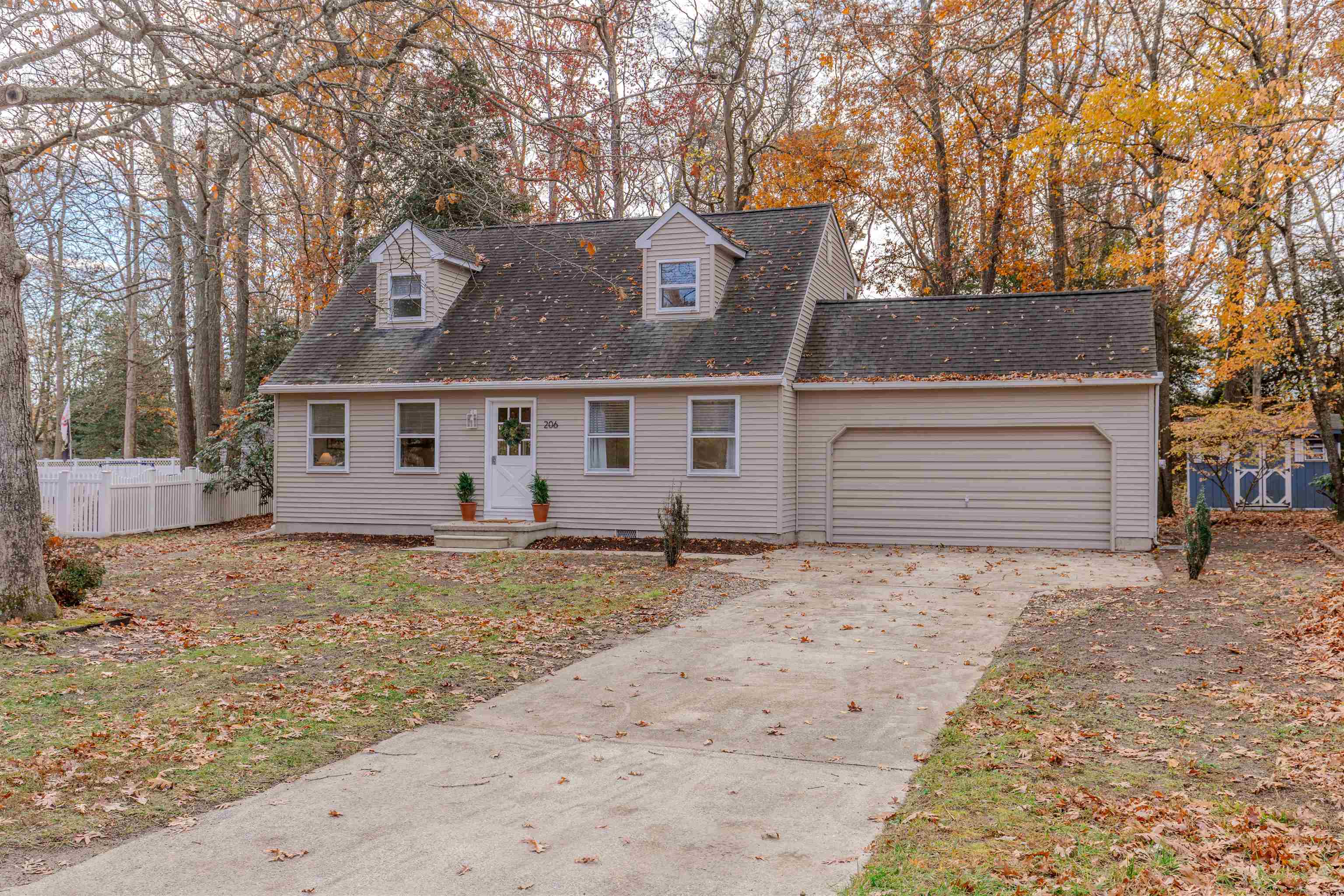 206 Holly Drive Rio Grande, NJ 08242 - Photo 30 of 30 front view of a house with a yard