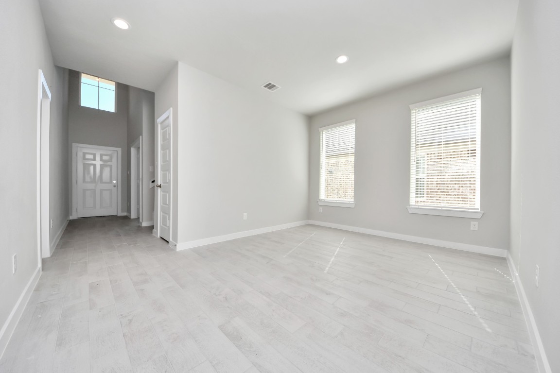 15802 Telge Ridge Lane Cypress, TX 77429 - Photo 17 of 45 an empty room with windows and closet