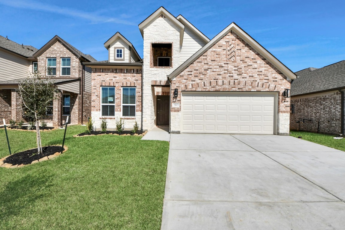 15802 Telge Ridge Lane Cypress, TX 77429 - Photo 2 of 45 a view of a house with a yard