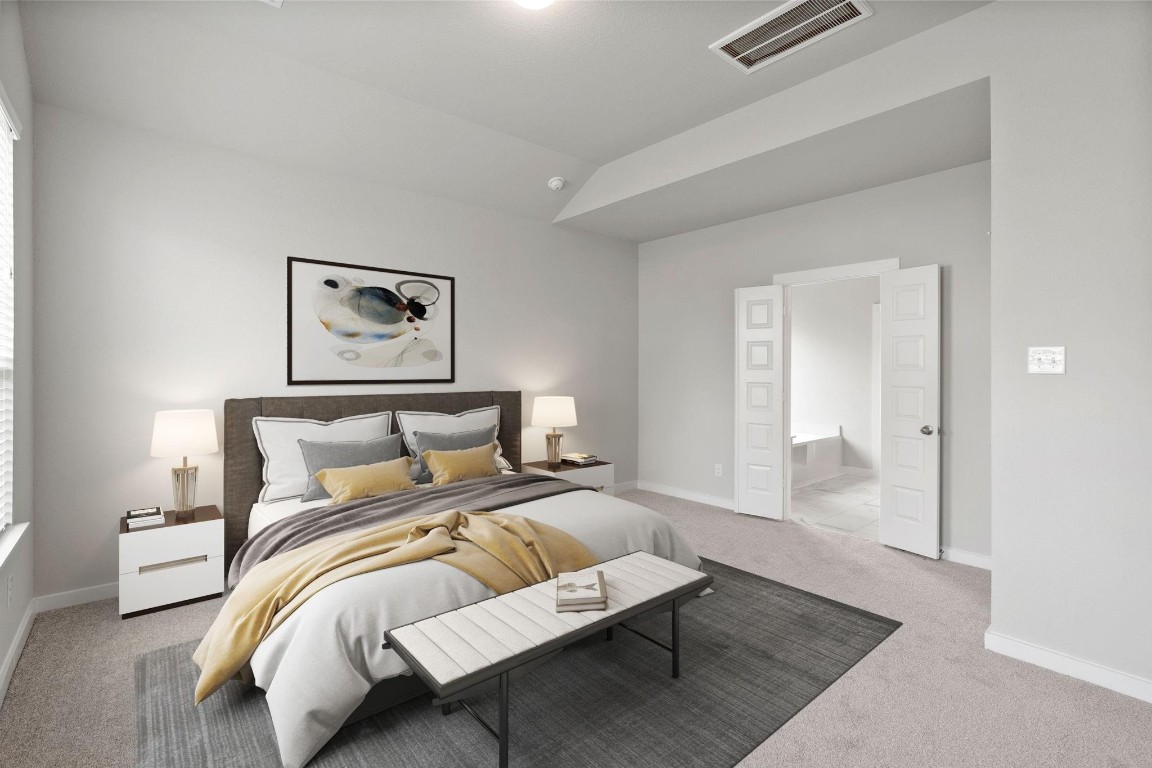 15802 Telge Ridge Lane Cypress, TX 77429 - Photo 30 of 45 a bedroom with a bed and a night stand