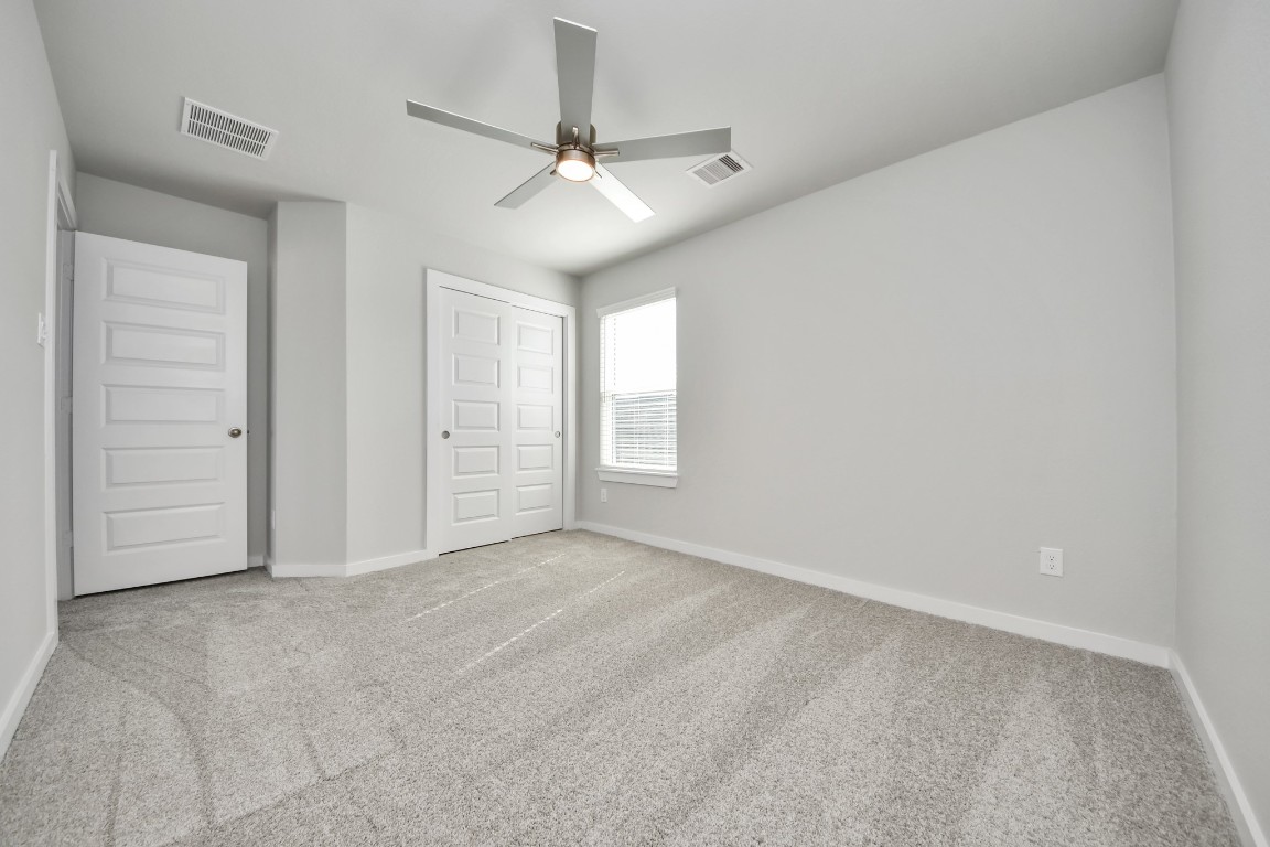 15802 Telge Ridge Lane Cypress, TX 77429 - Photo 38 of 45 a view of an empty room with a window