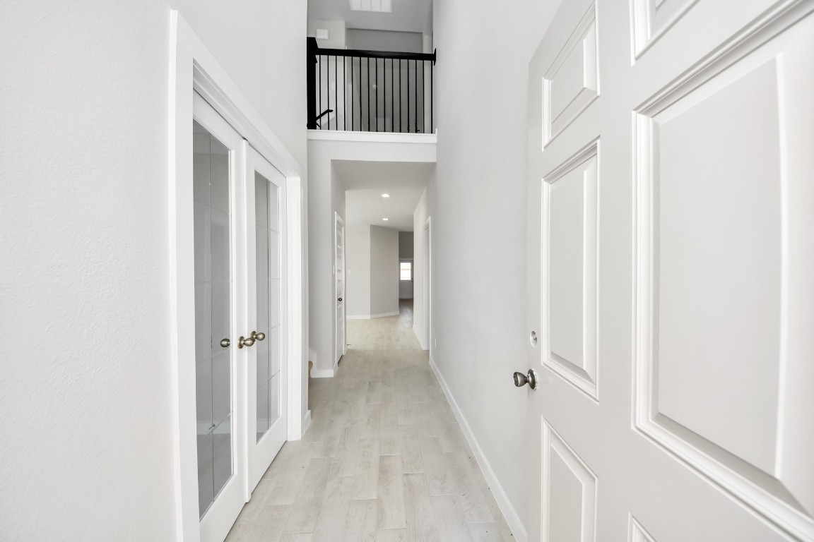 15802 Telge Ridge Lane Cypress, TX 77429 - Photo 12 of 45 a view of a hallway with a white walls