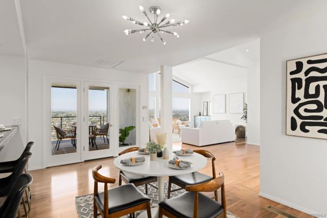 a kitchen with stainless steel appliances kitchen island granite countertop a sink and cabinets