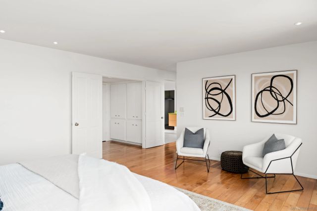 a kitchen with stainless steel appliances a refrigerator and a stove