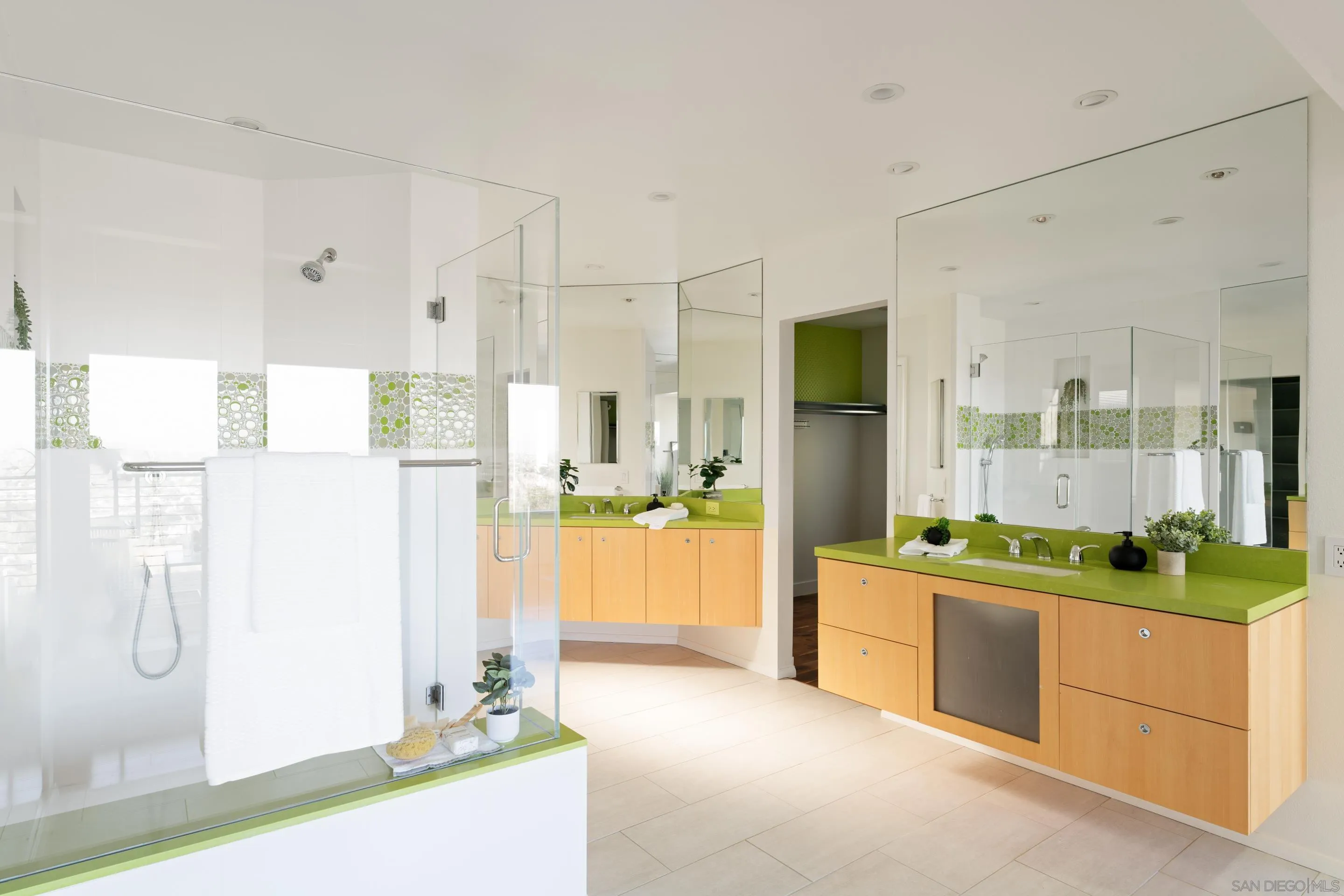 5665 Soledad Mountain Road La Jolla, CA 92037 - Photo 26 of 52 a kitchen with stainless steel appliances a refrigerator and a stove