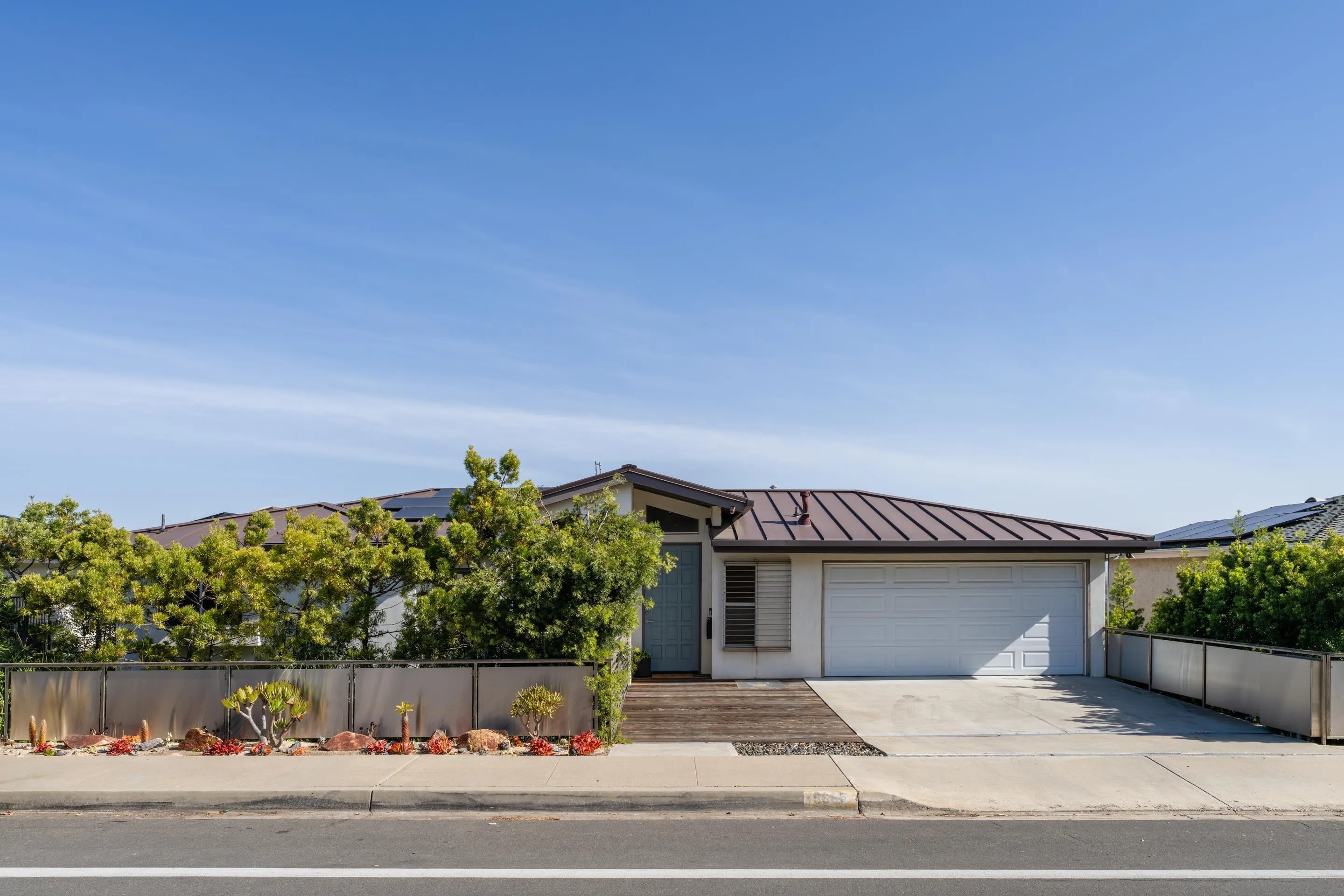 5665 Soledad Mountain Road La Jolla, CA 92037 - Photo 34 of 52 front view of a house with a street