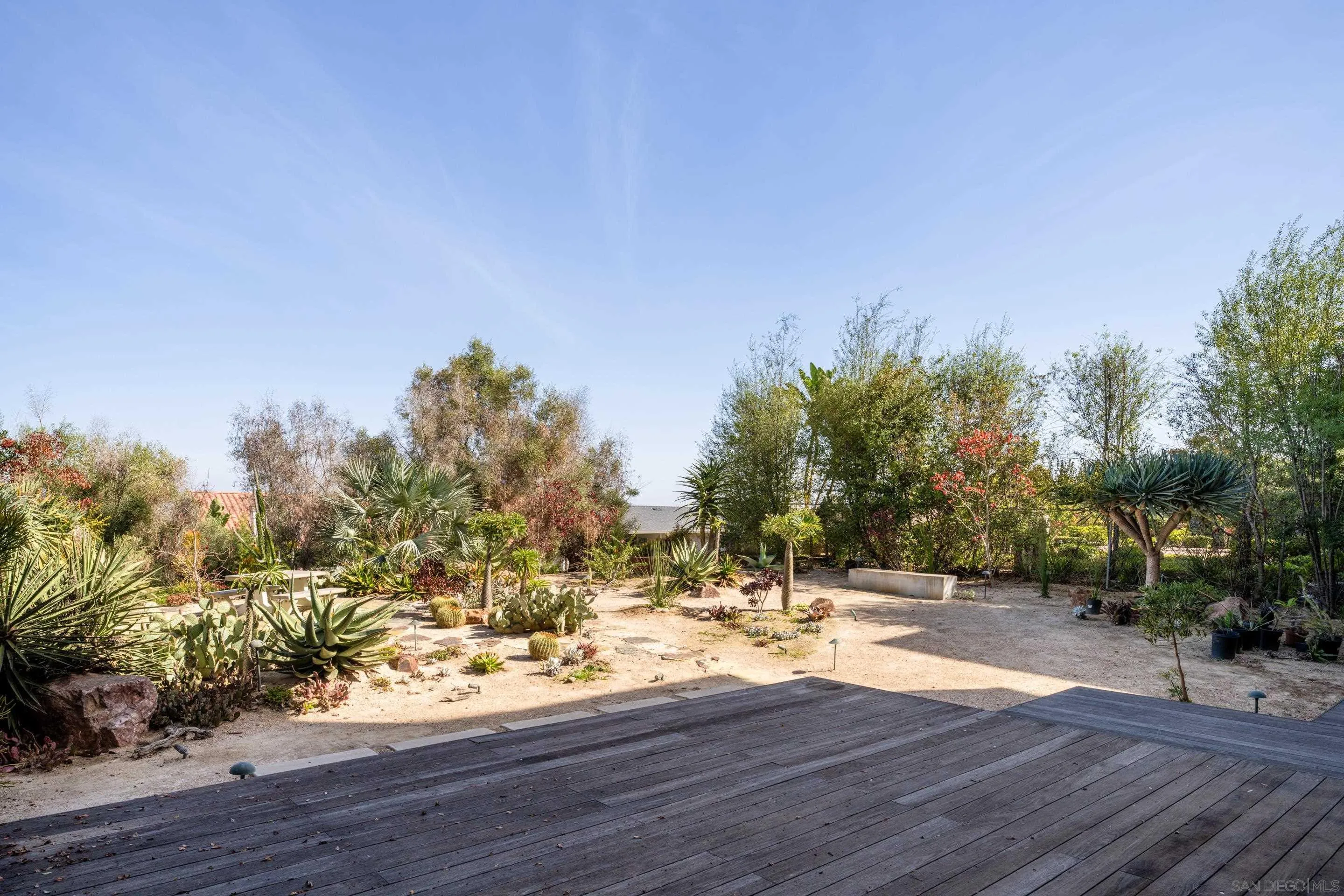 5665 Soledad Mountain Road La Jolla, CA 92037 - Photo 38 of 52 a view of a yard with wooden fence