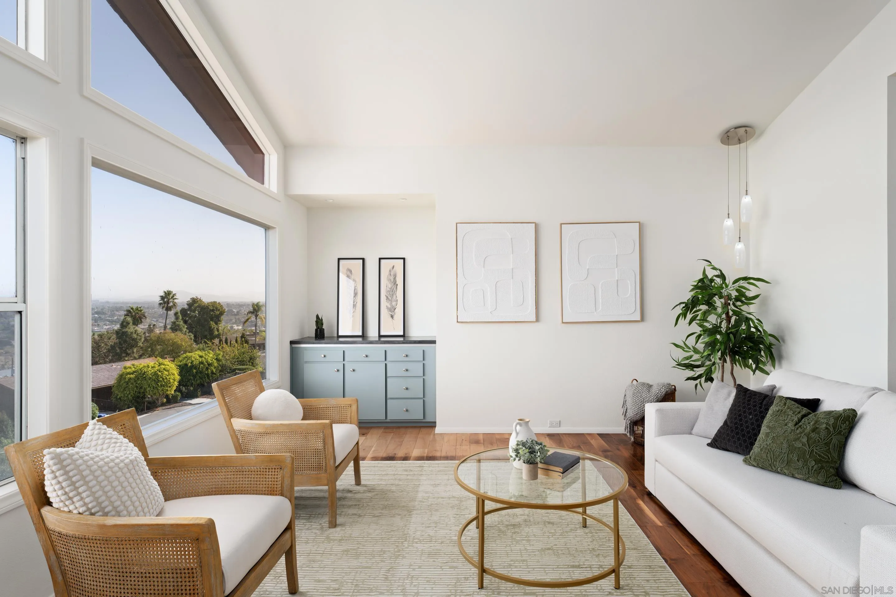 5665 Soledad Mountain Road La Jolla, CA 92037 - Photo 5 of 52 a living room with furniture and a large window