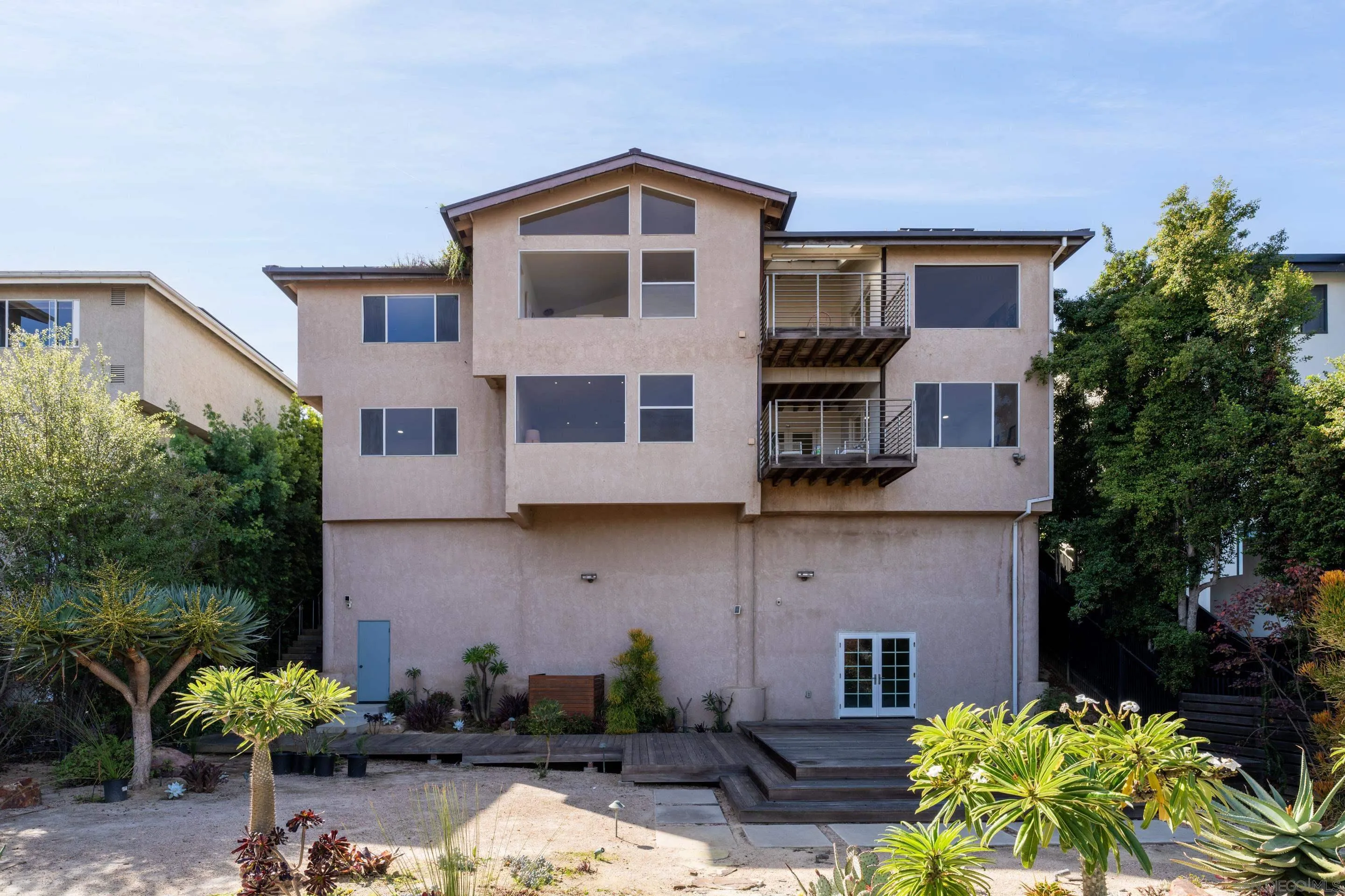 5665 Soledad Mountain Road La Jolla, CA 92037 - Photo 51 of 52 a front view of a house with a yard