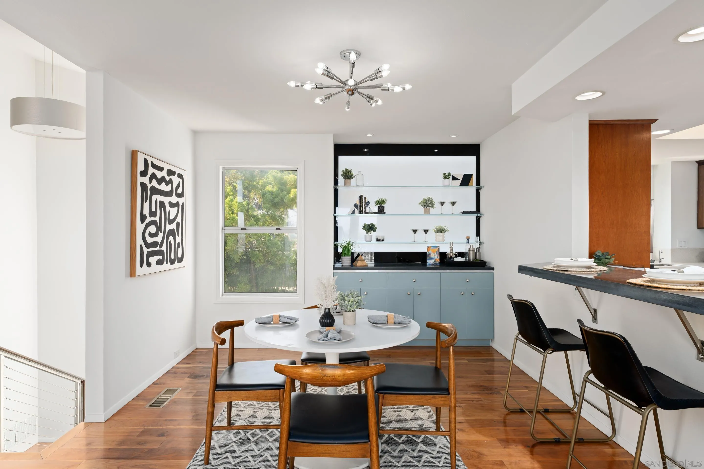 5665 Soledad Mountain Road La Jolla, CA 92037 - Photo 10 of 52 a view of a dining room with furniture window and outside view