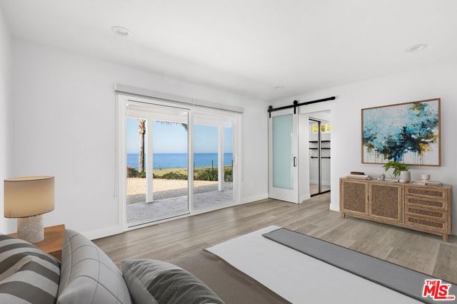 a living room with furniture and view of living room