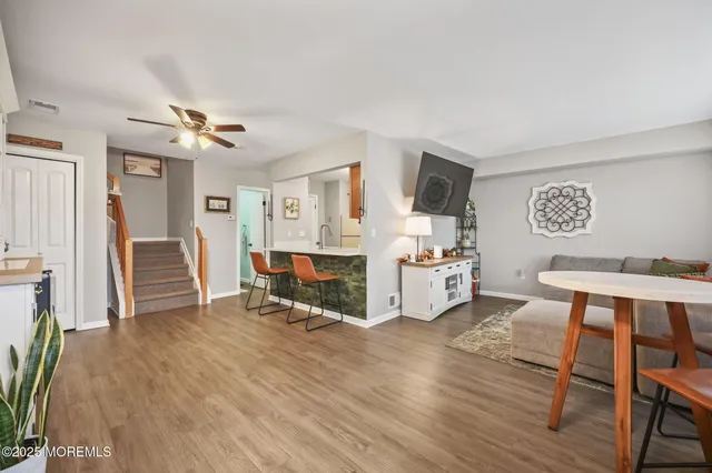 a living room with furniture and a table