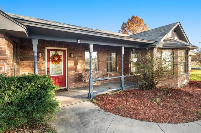 a view of a house with a porch