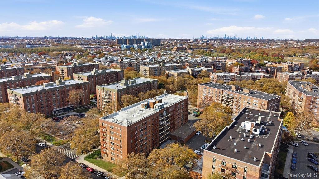 153-25 88th Street, Unit 4N Queens, NY 11414 - Photo 10 of 11 an aerial view of a city with lots of residential buildings