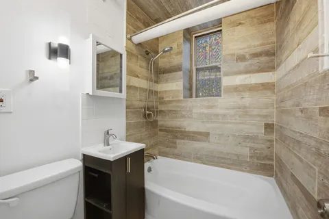 a bathroom with a sink and a bathtub