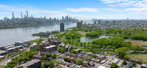 a view of a lake with a city