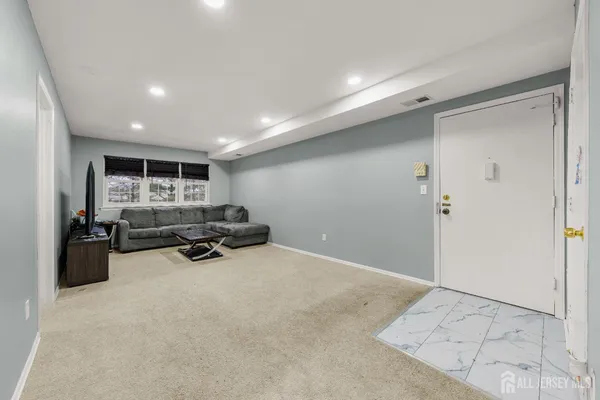 a room with furniture and a wooden floor