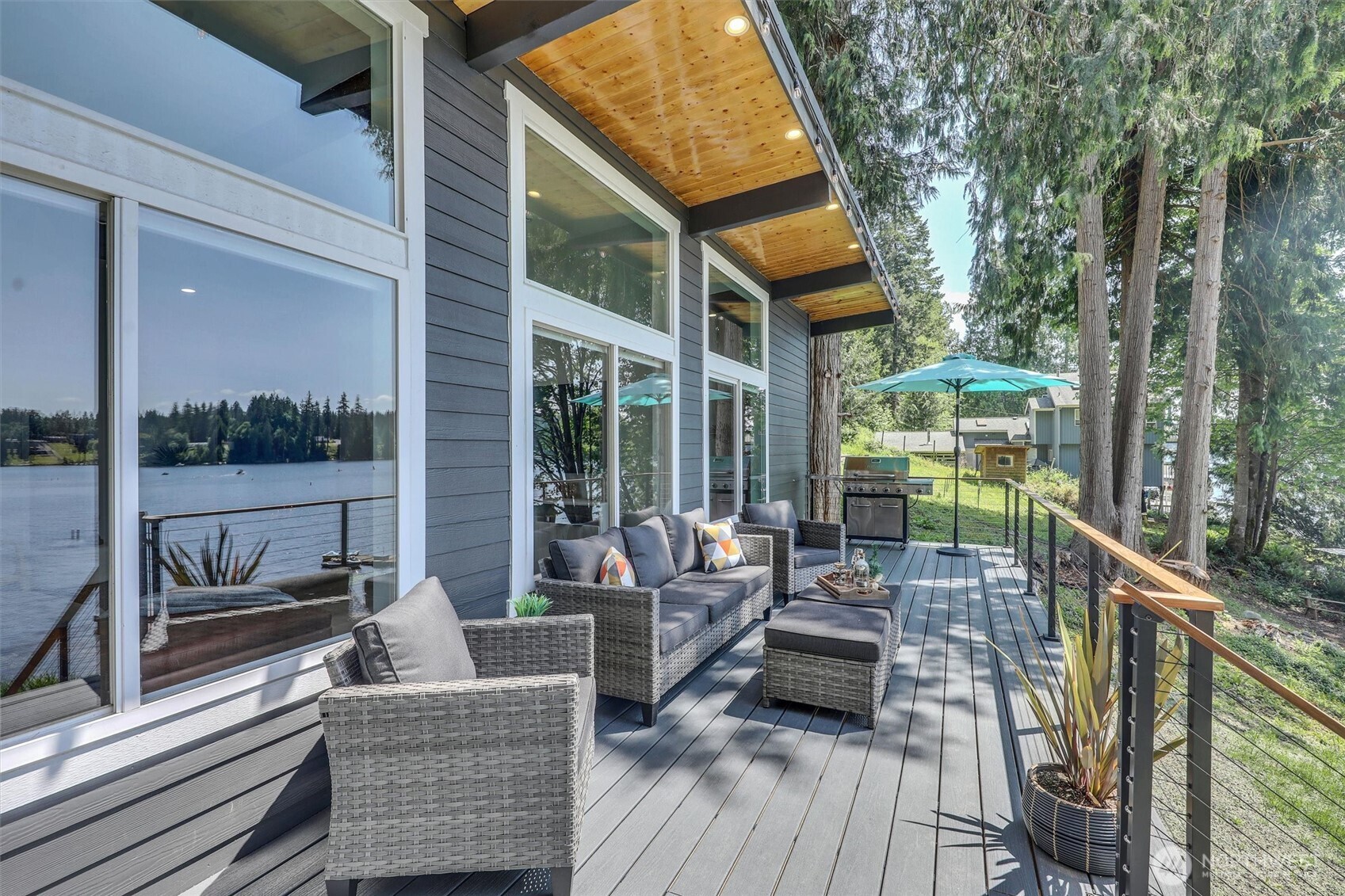 4902 Weber Road Snohomish, WA 98290 - Photo 8 of 40 a view of balcony with couch and wooden floor
