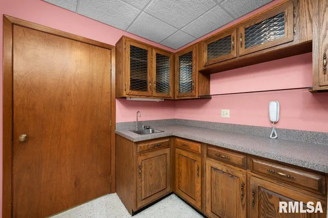 a room with stairs and a table