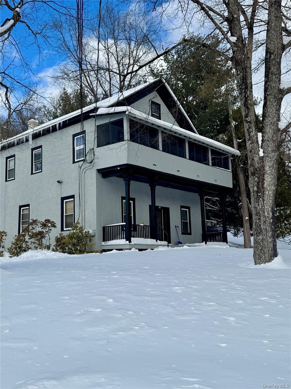 110 Titicus Road North Salem, NY 10560 - Photo 1 of 12 a front view of a house with a yard covered with snow in front of house