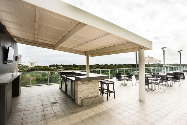 a outdoor space with lots of table and chairs