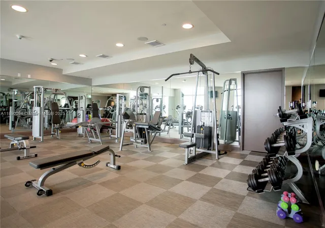 a view of a room with gym equipment