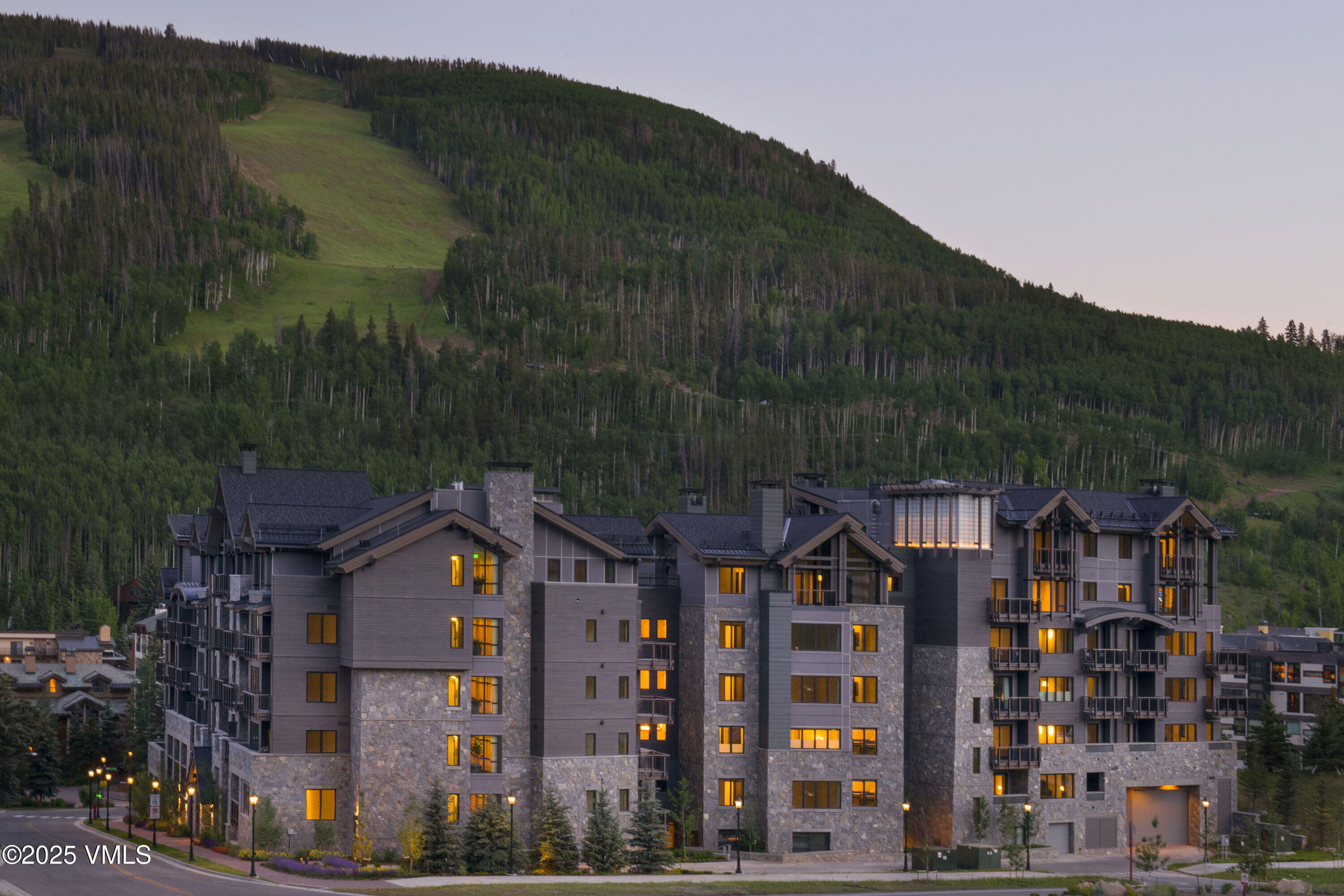 701 West Lionshead Circle, Unit W404 Vail, CO 81657 - Photo 1 of 45 TheLionSummer_SunsetEastView-large