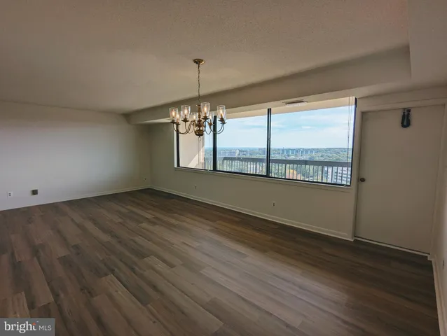 a view of a hallway with a small car