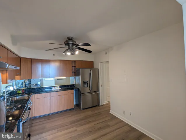 a view of a livingroom with wooden floor