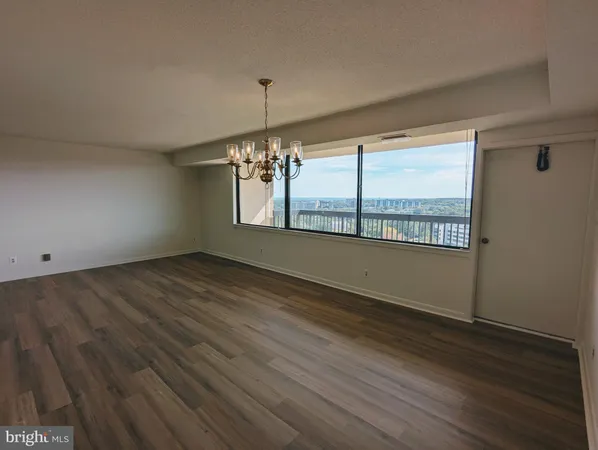 a view of a hallway with a small car