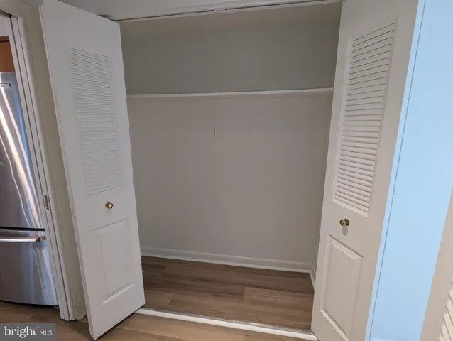 a view of a room with a large window