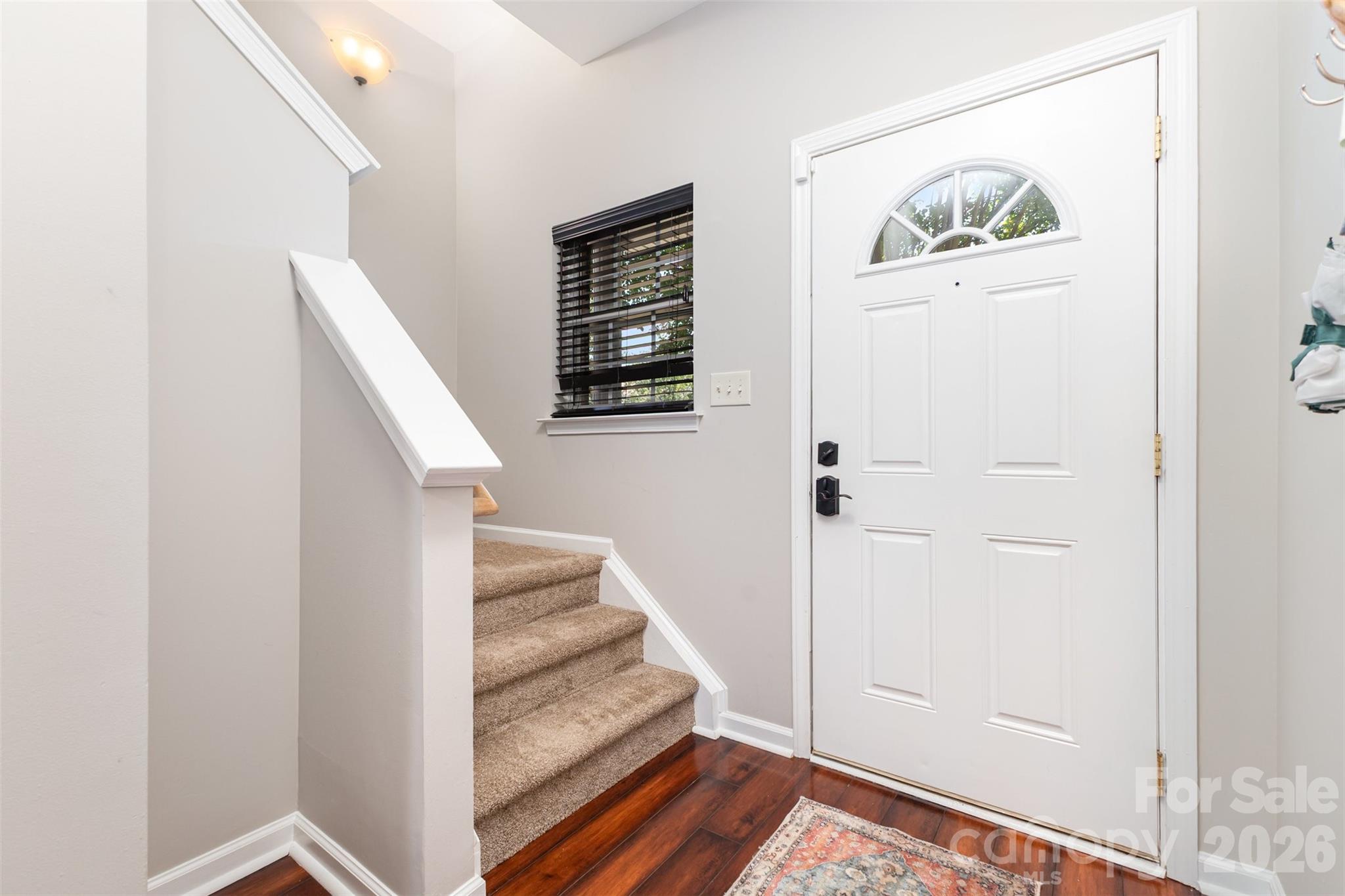 3832 Thomas Ridge Drive Charlotte, NC 28269 - Photo 6 of 33 a view of entryway with wooden floor