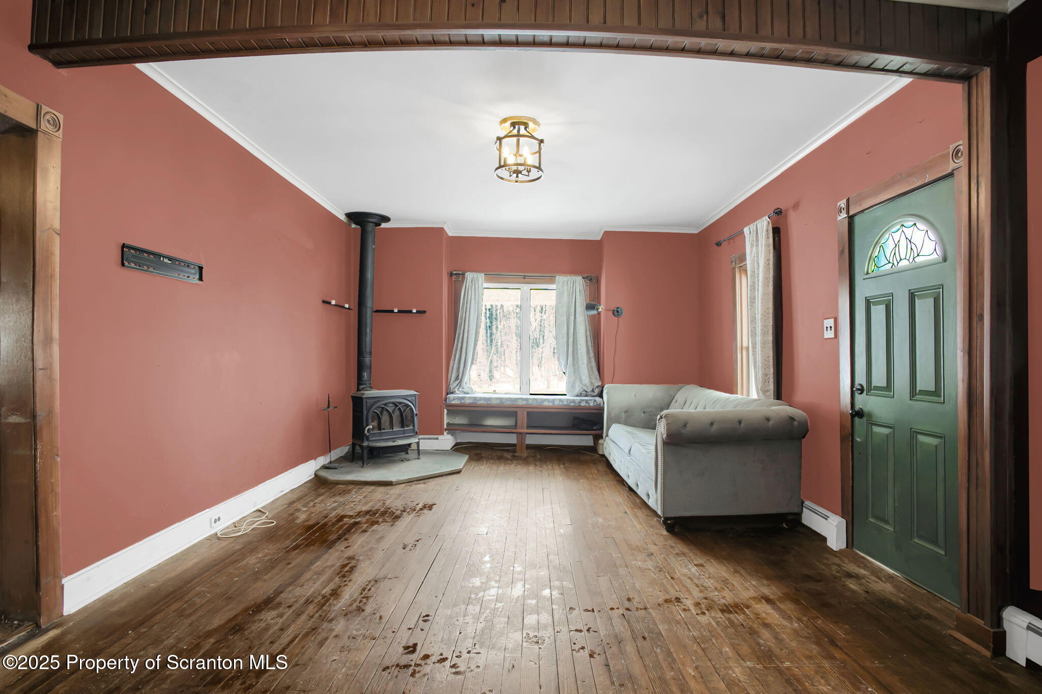 654 Cribbs Road Poyntelle, PA 18454 - Photo 12 of 67 a hallway with furniture and a window