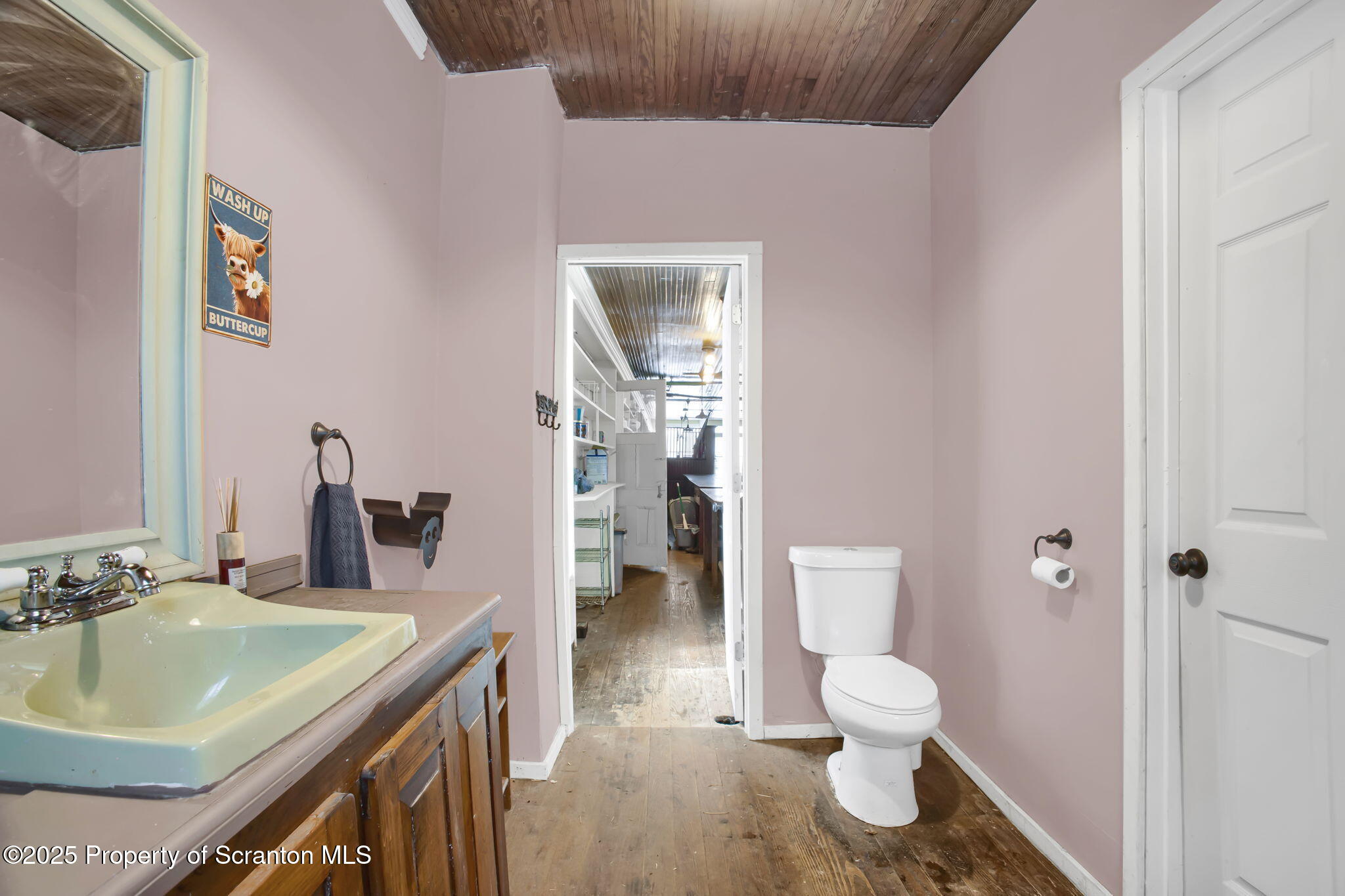 654 Cribbs Road Poyntelle, PA 18454 - Photo 19 of 67 a bathroom with a sink toilet and shower