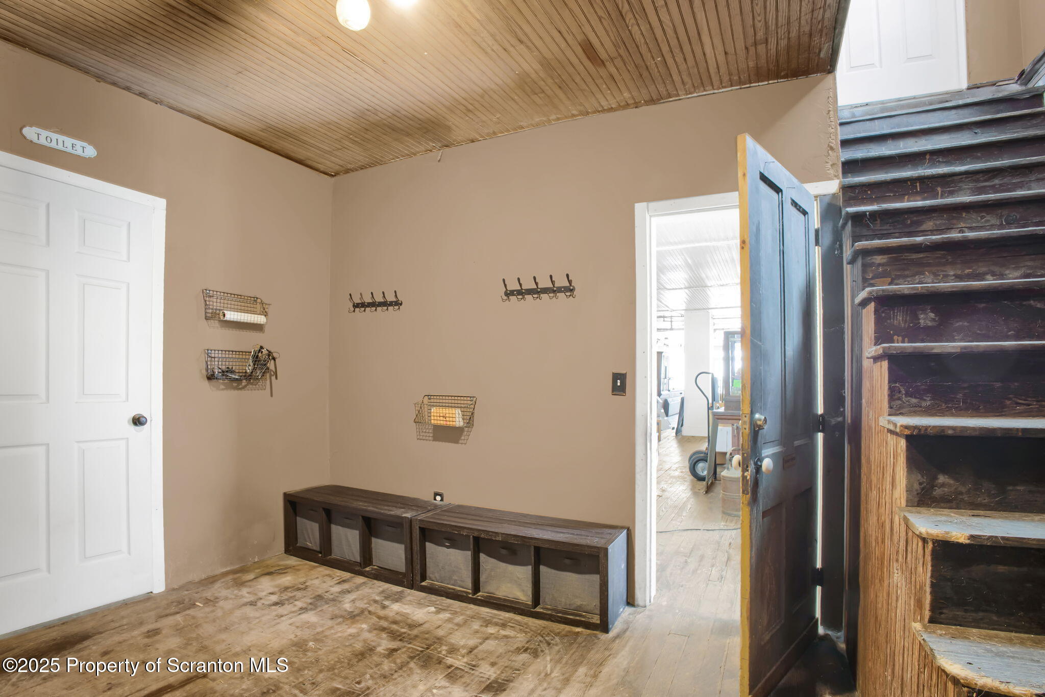 654 Cribbs Road Poyntelle, PA 18454 - Photo 20 of 67 a bedroom with a bed and a view of bathroom
