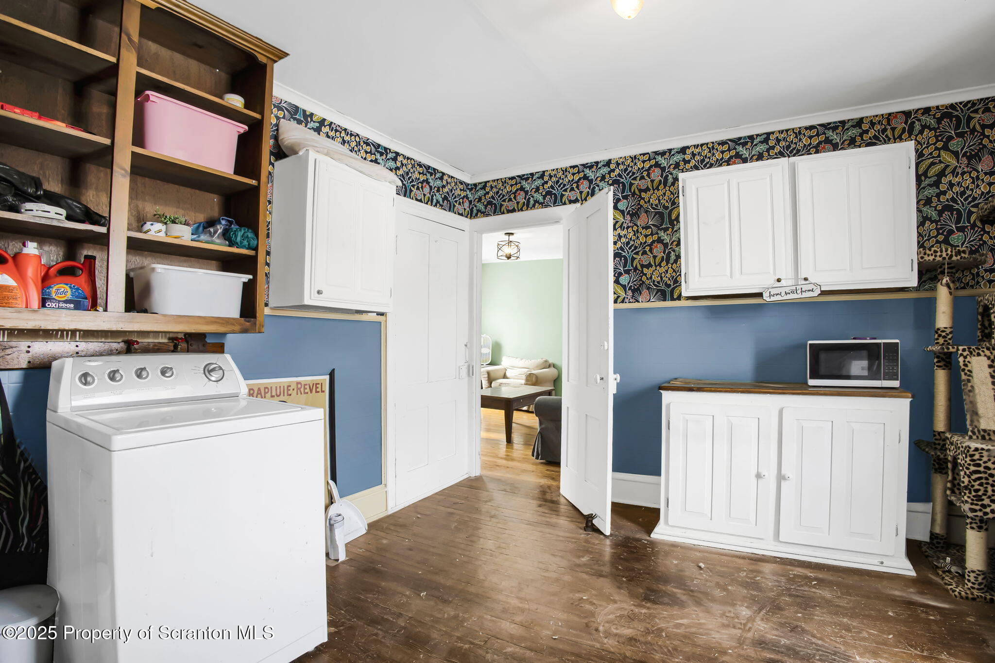 654 Cribbs Road Poyntelle, PA 18454 - Photo 27 of 67 a view of storage and utility room with washer and dryer