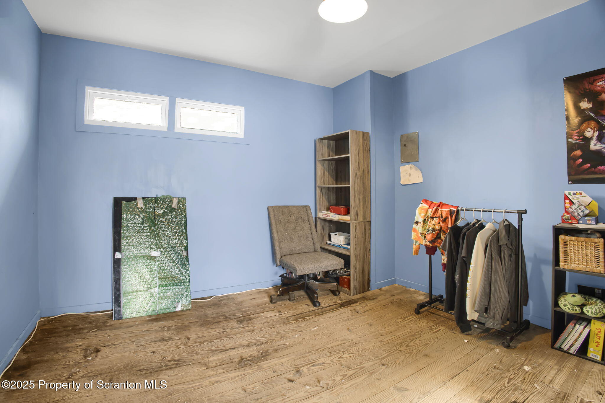 654 Cribbs Road Poyntelle, PA 18454 - Photo 31 of 67 a view of a workspace with furniture and a window
