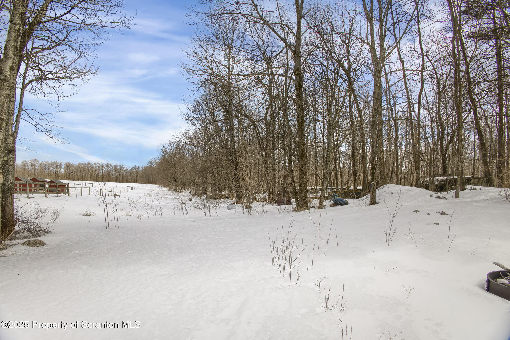 654 Cribbs Road Poyntelle, PA 18454 - Photo 56 of 67 a view of snow on the side of a road
