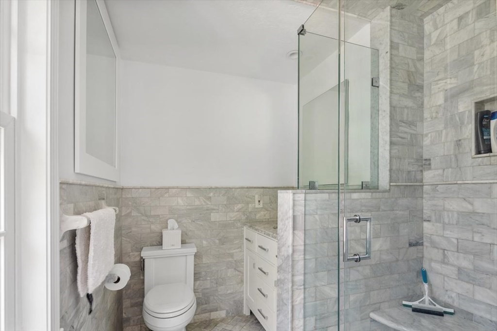 21 Berkley Circle Hingham, MA 02043 - Photo 15 of 34 a bathroom with a toilet and a shower