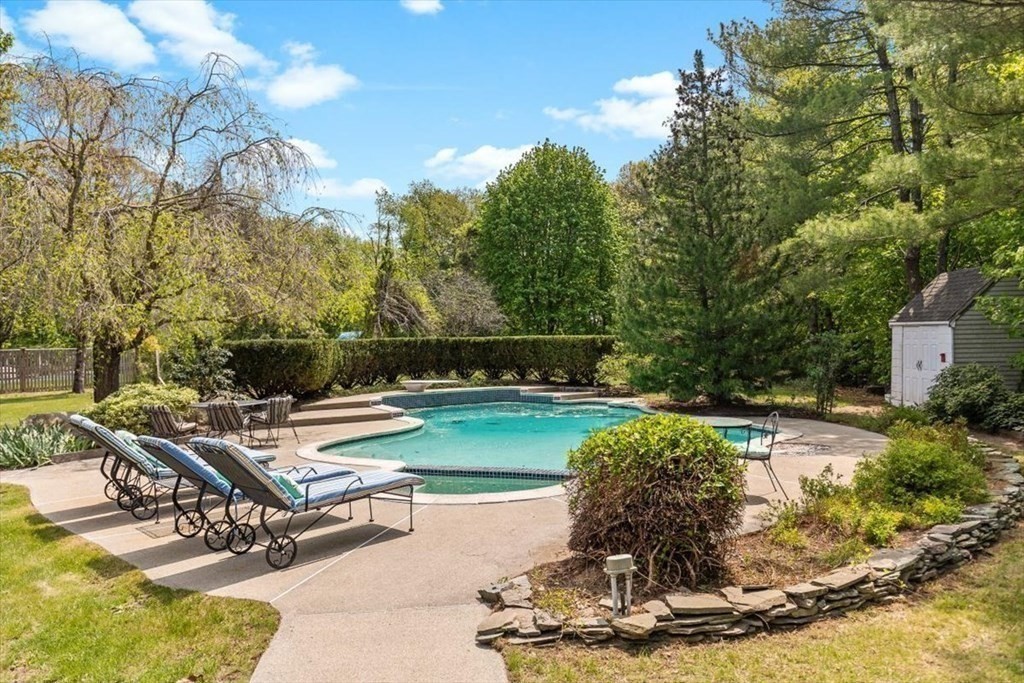 21 Berkley Circle Hingham, MA 02043 - Photo 23 of 34 a view of a backyard with sitting area