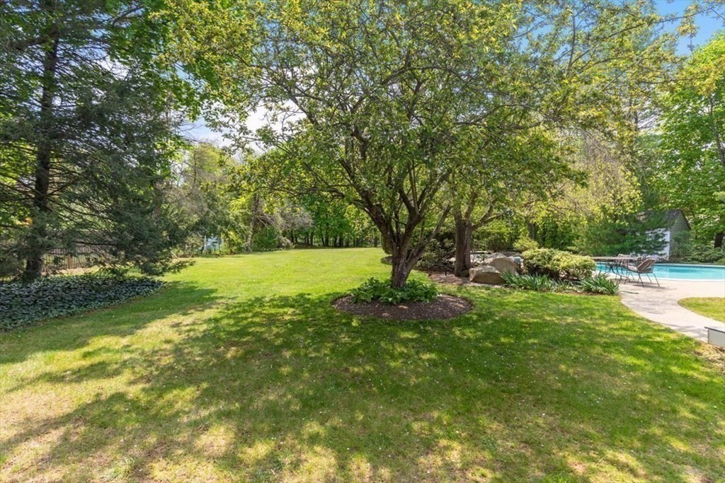 21 Berkley Circle Hingham, MA 02043 - Photo 26 of 34 a view of yard with green space and trees