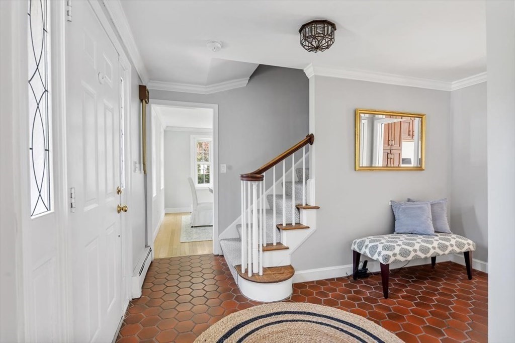 21 Berkley Circle Hingham, MA 02043 - Photo 4 of 34 a living room with furniture and a rug