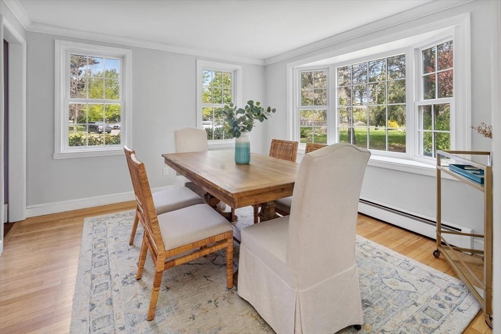 21 Berkley Circle Hingham, MA 02043 - Photo 9 of 34 a view of a dining room with furniture and a window