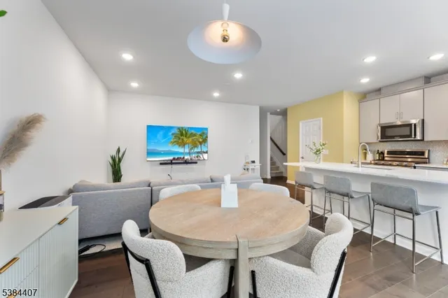 a white table and chairs in a room