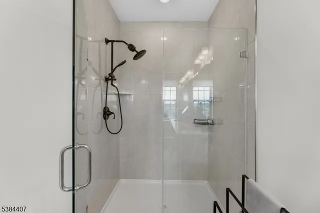 an aerial view of a city with streets and houses