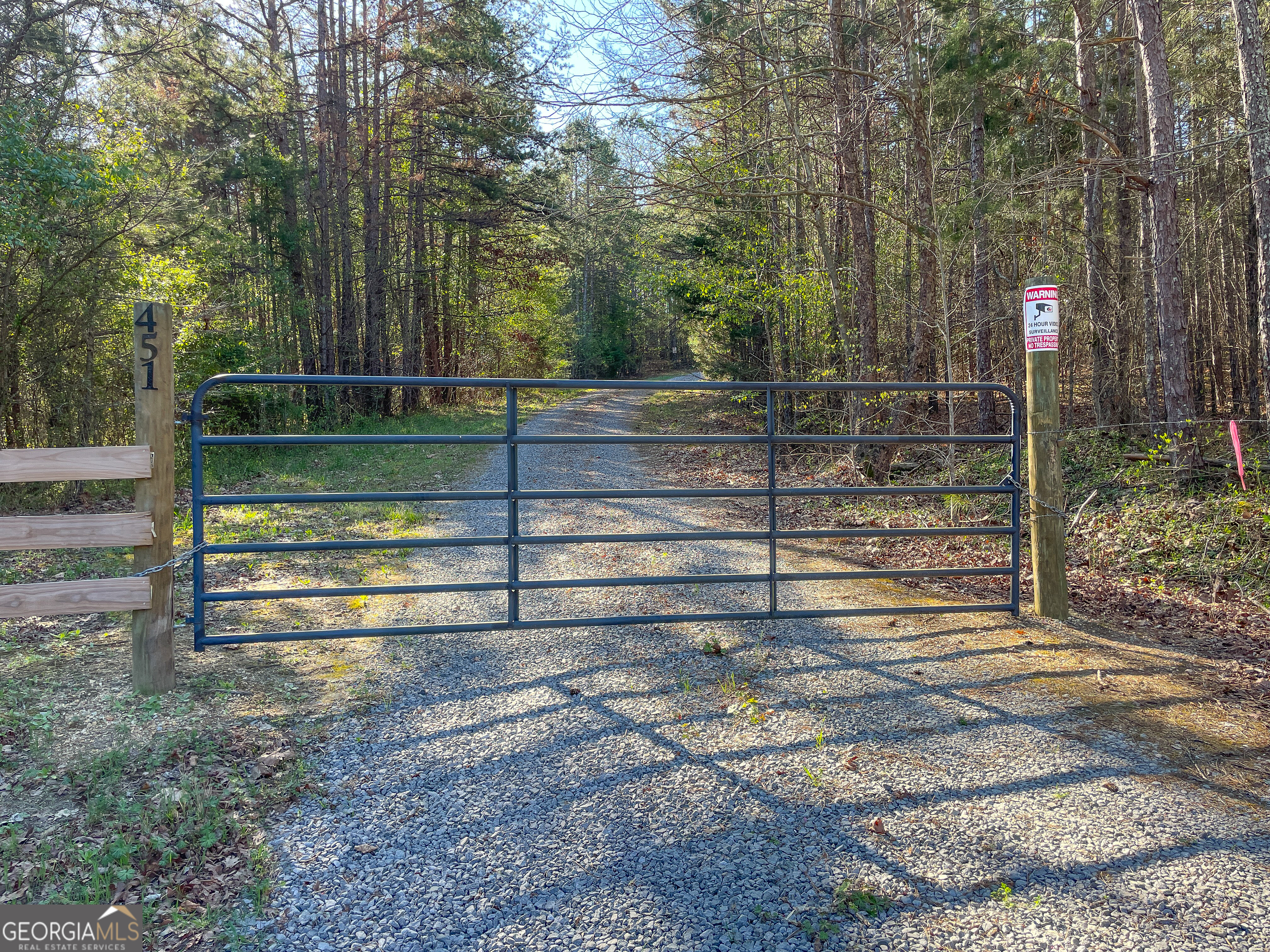 65 Acres On Half Mile Road Lyerly, GA 30730 - Photo 43 of 51 a view of backyard with wooden fence and trees