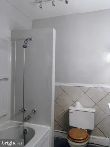 a view of a house with backyard and stairs